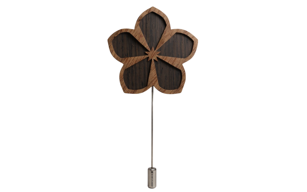 Timber Ties compass wooden lapel pin with four-petal clover design and natural wood grain